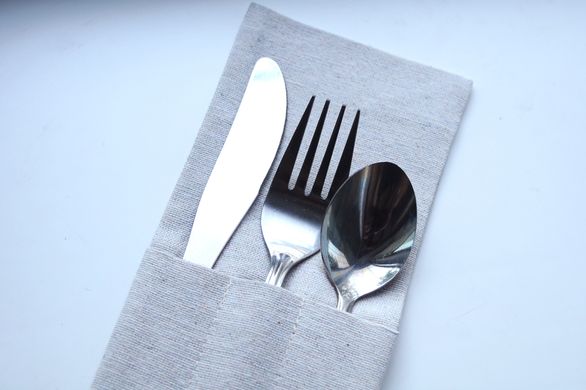 Linen cutlery pocket in ethnic style