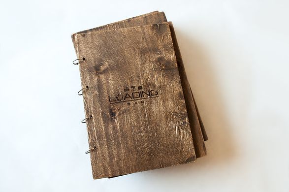 Wooden menu with logo